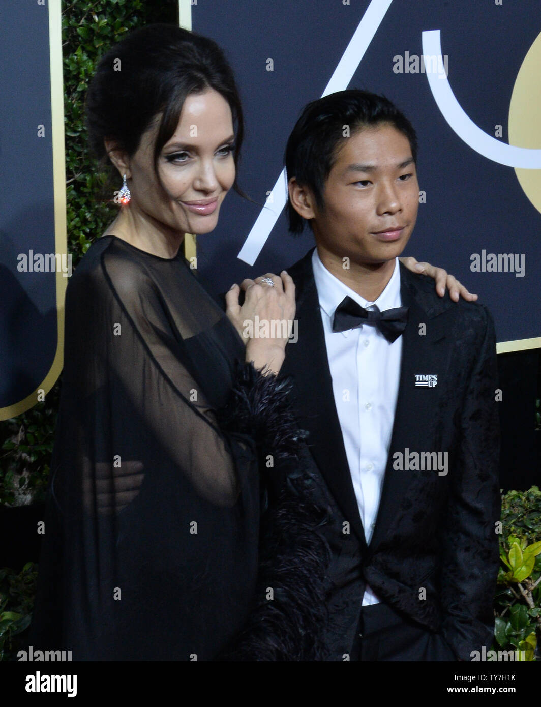 Actor Angelina Jolie (L) and Pax Thien Jolie-Pitt attend the 75th annual Golden Globe Awards at the Beverly Hilton Hotel in Beverly Hills, California on January 7, 2018. Photo by Jim Ruymen/UPI Stock Photo