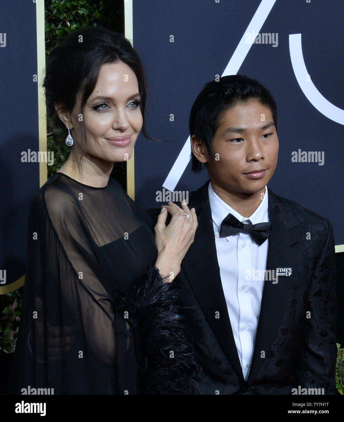 Actor Angelina Jolie (L) and Pax Thien Jolie-Pitt attend the 75th annual Golden Globe Awards at the Beverly Hilton Hotel in Beverly Hills, California on January 7, 2018. Photo by Jim Ruymen/UPI Stock Photo