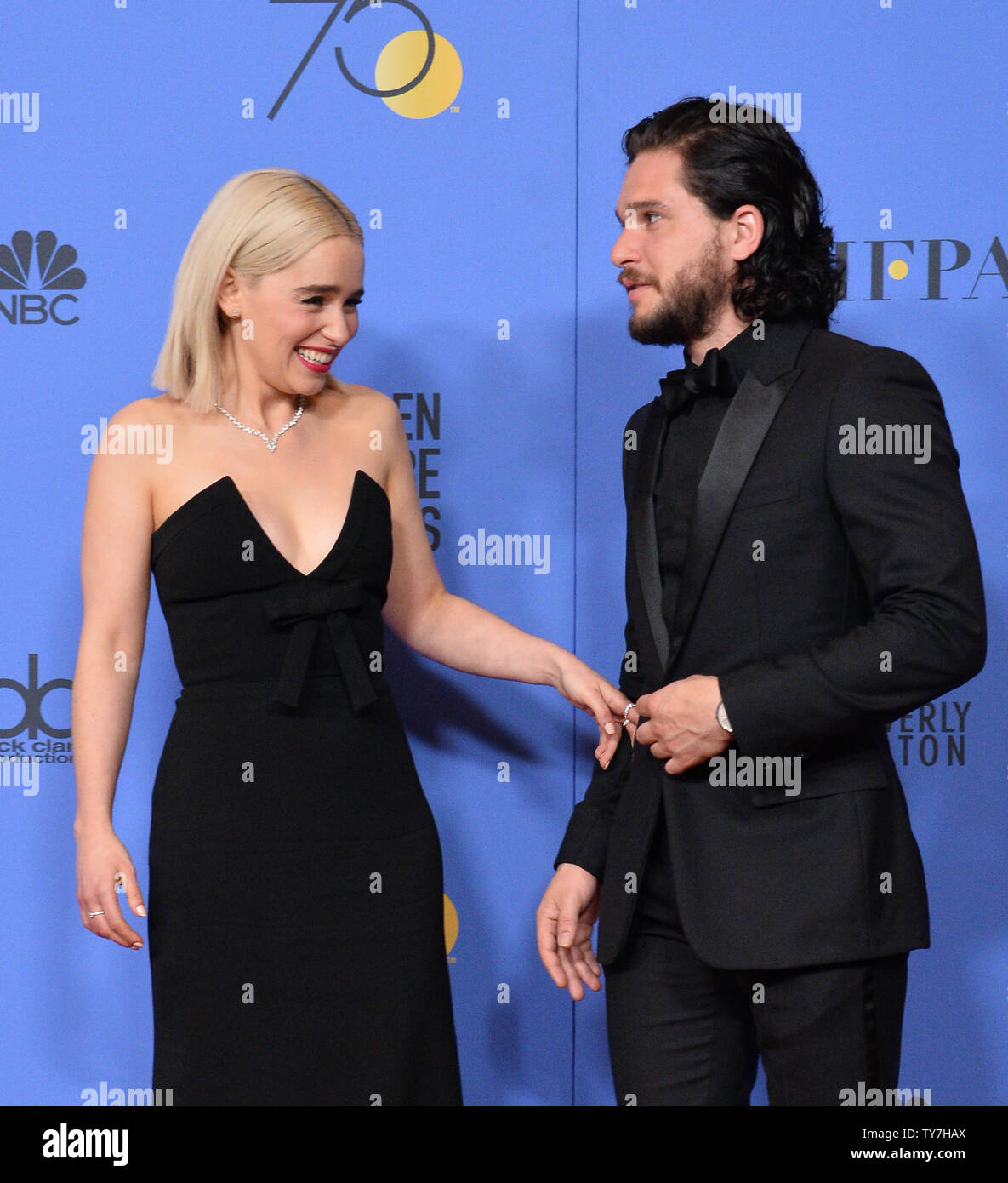Actors Emilia Clarke (L) and Kit Harington appear backstage during the 75th  annual Golden Globe Awards at the Beverly Hilton Hotel in Beverly Hills,  California on January 7, 2018. Photo by Jim, image size:1185x1390