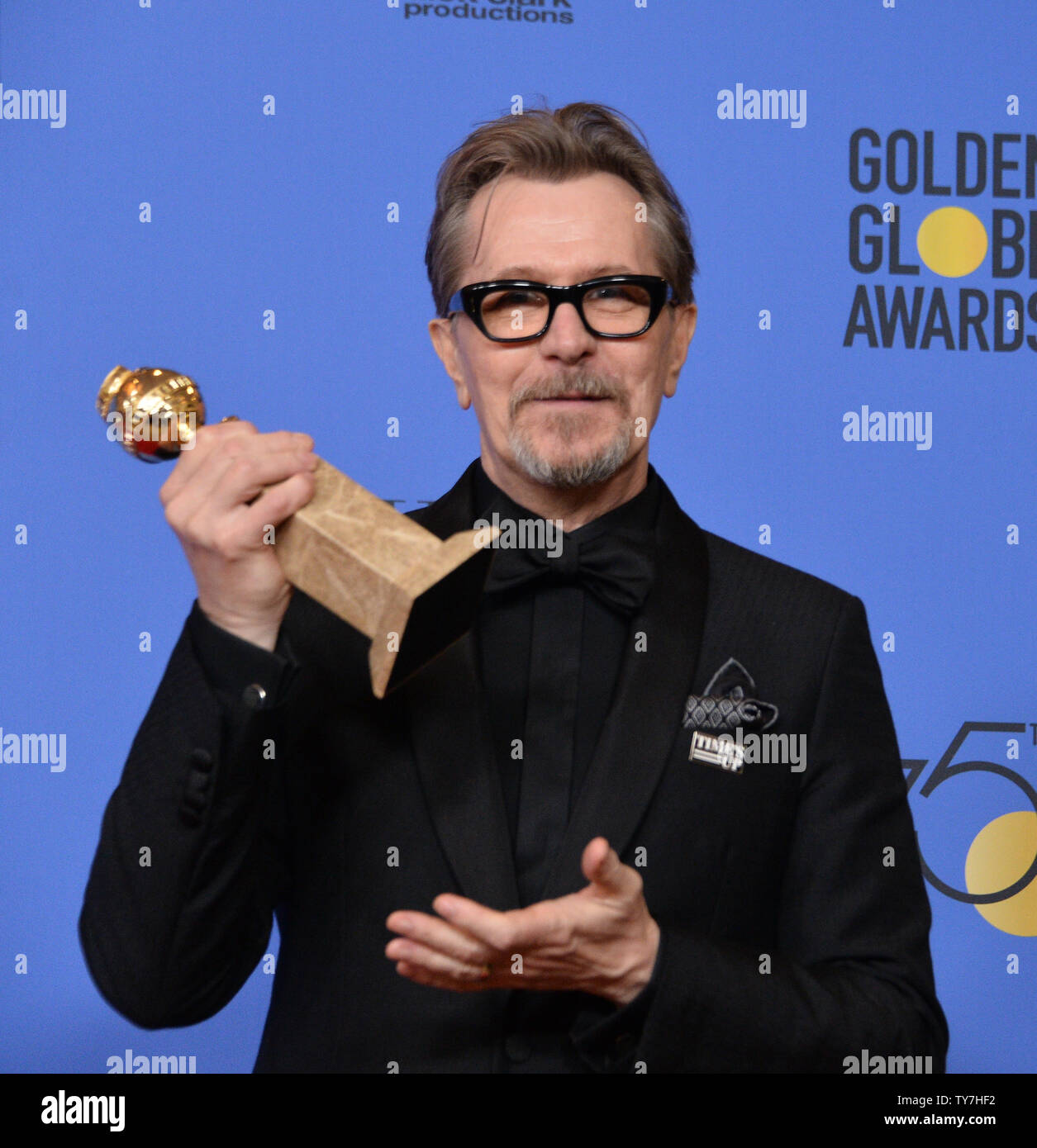 Actor Gary Oldman appears backstage after winning the award for Best