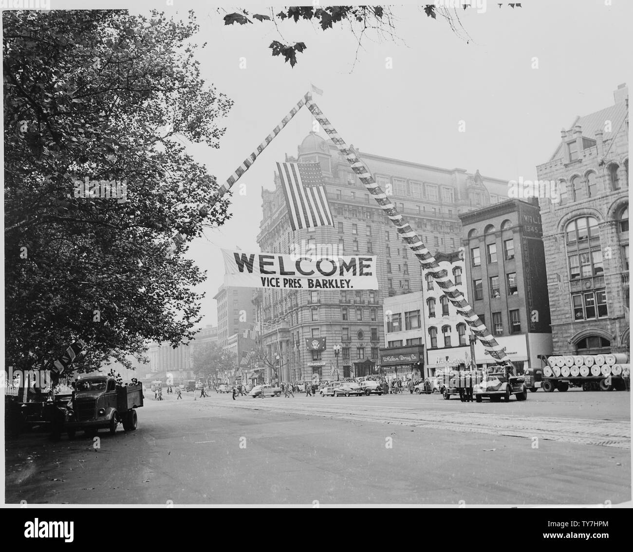 Large sign hung above Pennsylvania Ave., near the Willard Hotel, saying, Welcome Vice Pres. Barkley. President Harry S. Truman and Vice President-elect Alben W. Barkley had just returned to Washington, DC after their victory in the 1948 election. Stock Photo