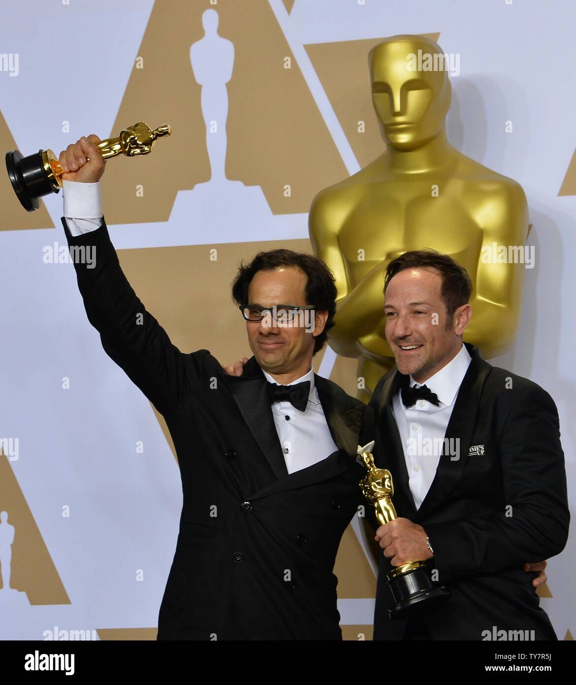 (L-R) Dan Cogen and Bryan Fogel, winners of the Best Documentary ...