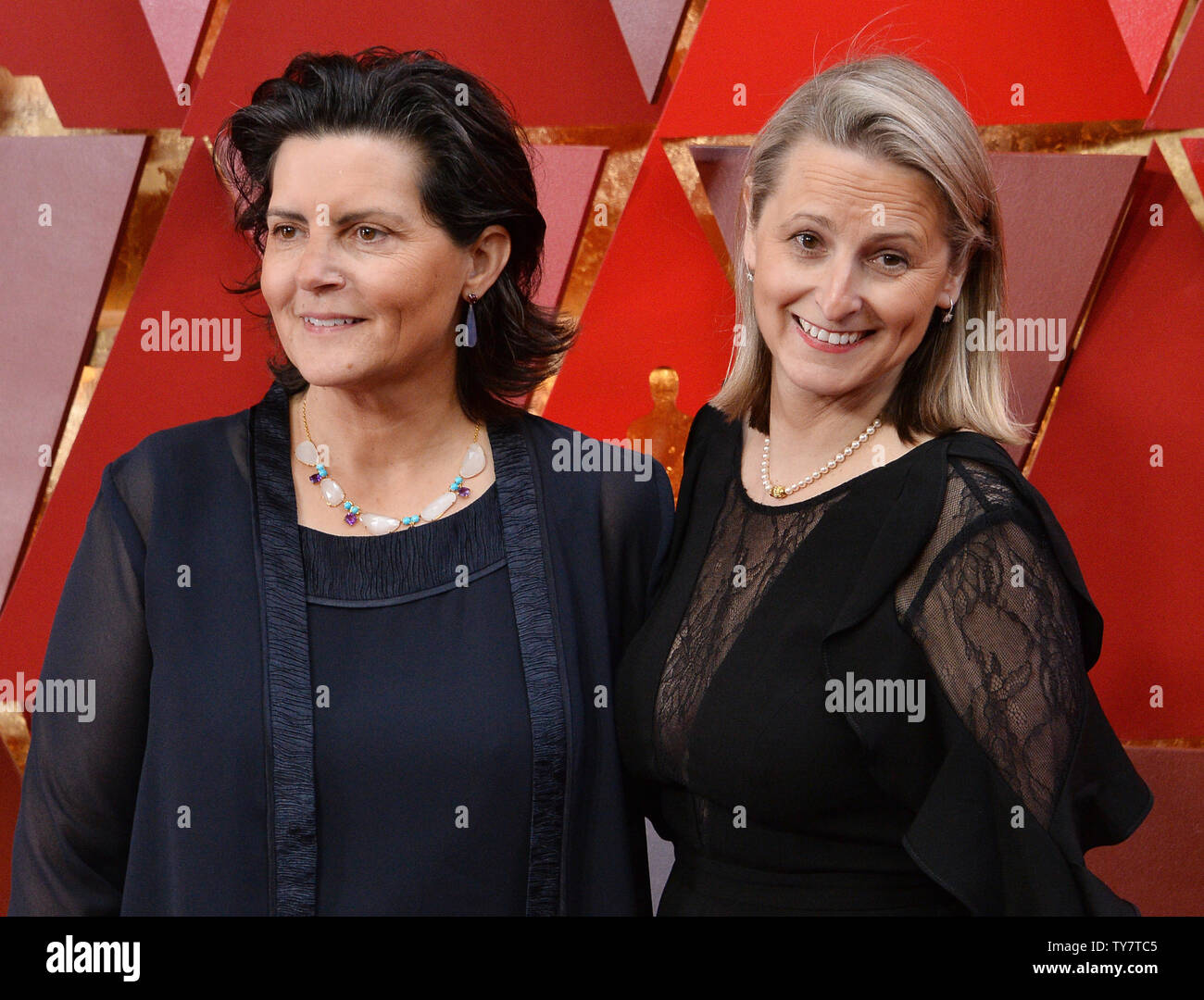 Film editor Tatiana S. Riegel and guest arrive on the red carpet for ...