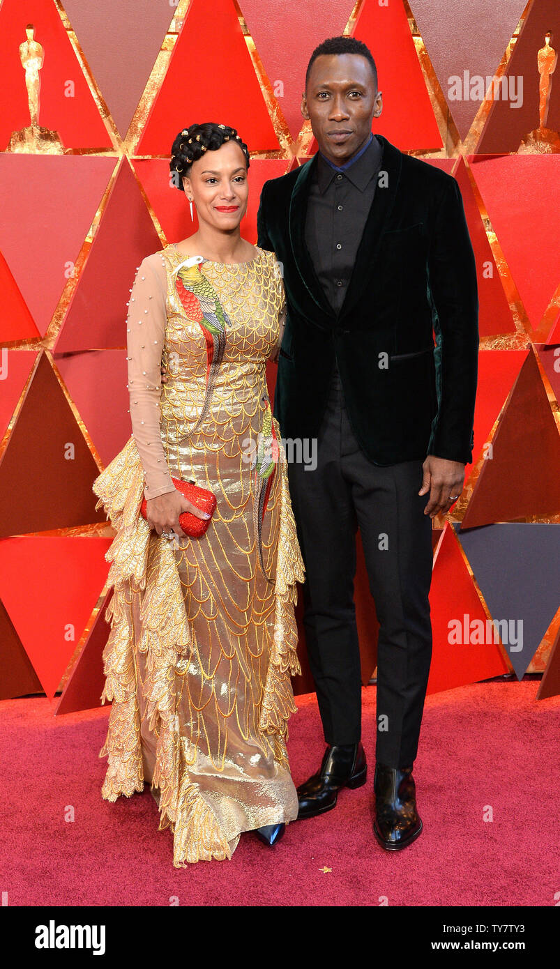 Actor Mahershala Ali (R) and Amatus Sami Karim arrive on the red carpet
