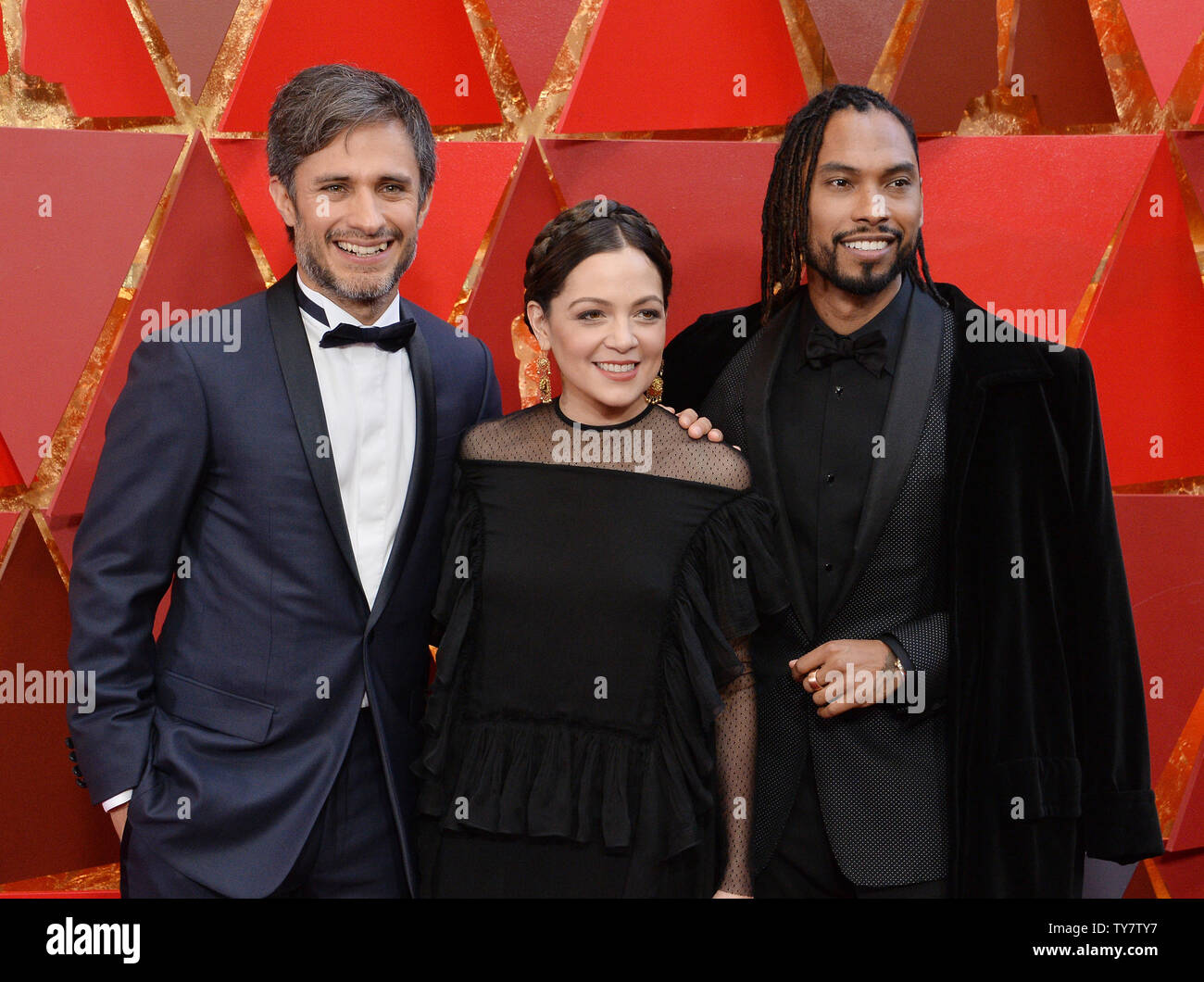L R Gael Garcia Bernal Natalia Lafourcade And Miguel Arrive On The Red Carpet For The 90th Annual Academy Awards At The Dolby Theatre In The Hollywood Section Of Los Angeles On March