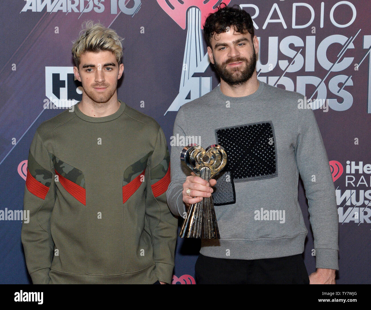 Andrew gart L And Alex Pall Of The Chainsmokers Winners Of Best Collaboration For Something Just Like This Dance Artist Of The Year And Dance Album Of The Year For Memories Do Not