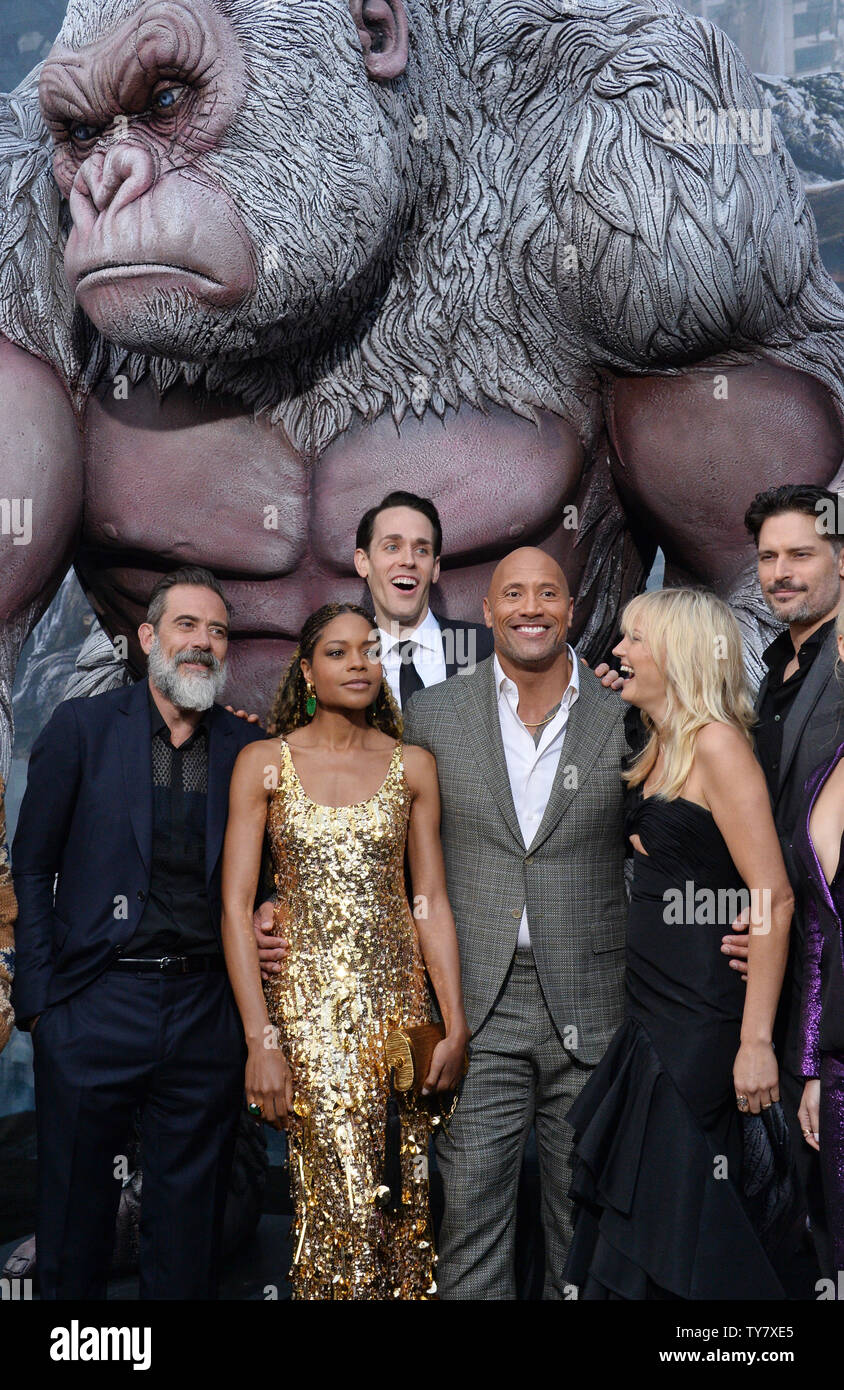 Cast members from left Jeffrey Dean Morgan, Naomie Harris, Jason Liles, Dwayne Johnson, Malin Akerman and Joe Manganiello attend the premiere of the sci-fi motion picture 'Rampage' at the Microsoft Theater in downtown Los Angeles on April 4, 2018. Storyline: The film follows a primatologist who must team-up with George, an albino gorilla who turns into a raging creature of enormous size following a rogue experiment, in order to stop an invasion of monsters.  Photo by Jim Ruymen/UPI Stock Photo