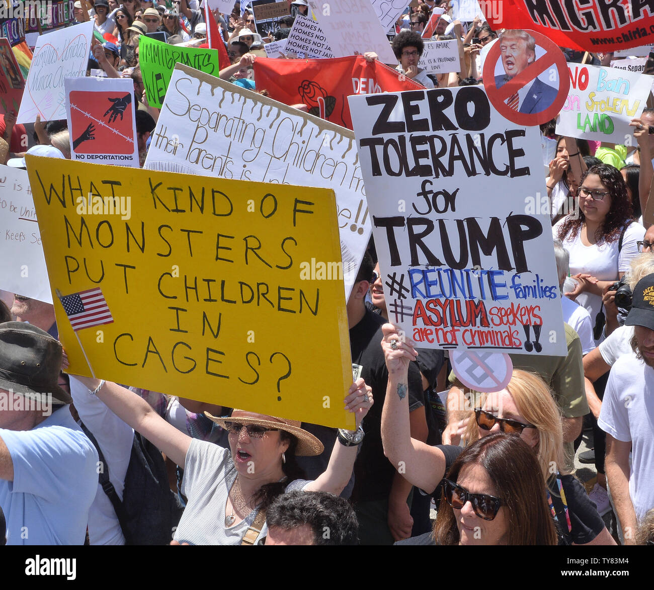 A coalition of advocacy groups flood the streets of downtown Los ...