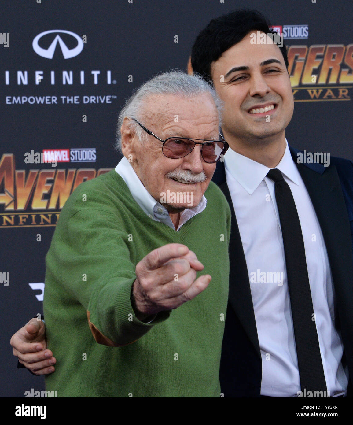 Marvel's Stan Lee (L) and Keya Morgan attend the April premiere of "Avengers: Infinity War" in Los Angeles. Morgan, who until recently was managing Lee's affairs is currently under investigation for elder abuse. In a related case, Morgan's attorney entered a not guilty plea  Monday on behalf of his client, who is charged with calling 911 to report that authorities conducting a welfare check on the 95-year-old Lee were burglars.    File Photo by Jim Ruymen/UPI Stock Photo