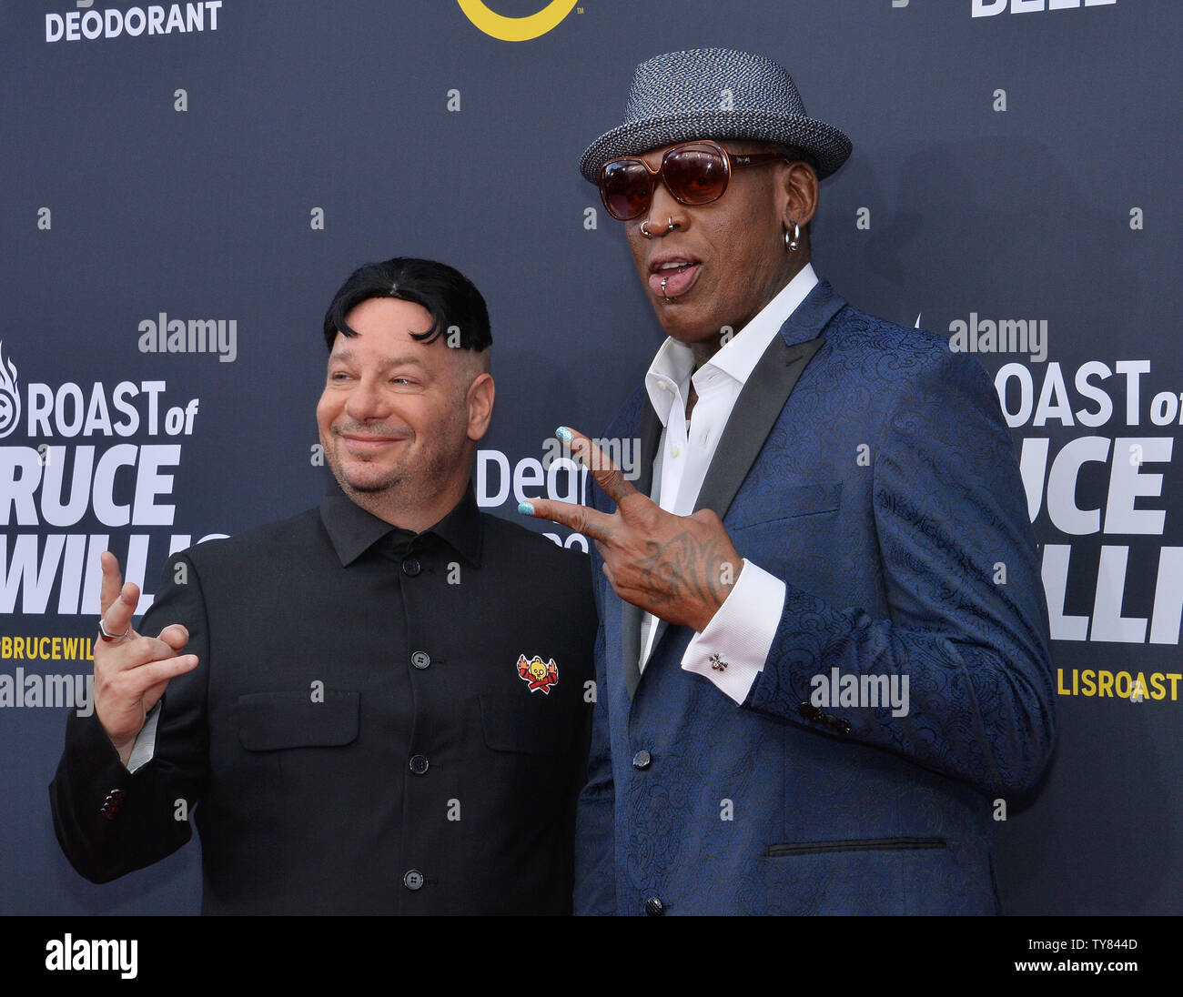 Comdian Jeff Ross and former NBA player Dennis Rodman arrive for Comedy