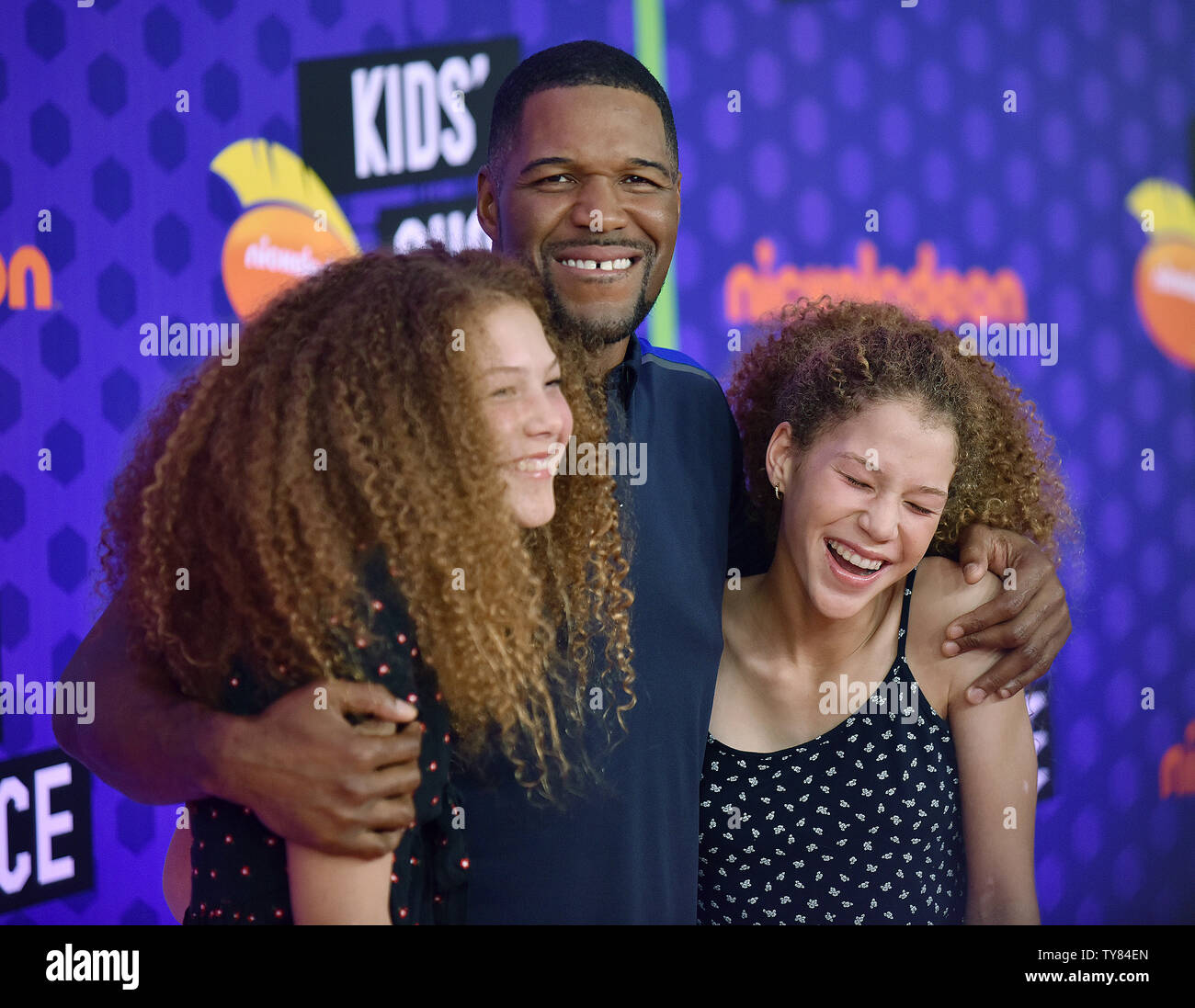 Michael Strahan and his daughters Isabella and Sophia attend Nickelodeon's KIds' Choice Sports Awards 2018 at Barker Hangar in Santa Monica, California on July 19, 2018. Photo by Chris Chew/UPI Stock Photo