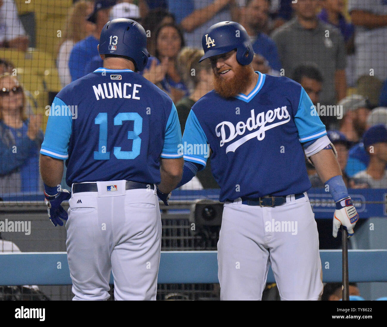 Los Angeles Dodgers' infielder Max Muncy celebrates with teammate Justin  Turner after hitting a two run homer in the seventh inning off San Diego  Padres' relief pitcher Phil Maton (88) at Dodger