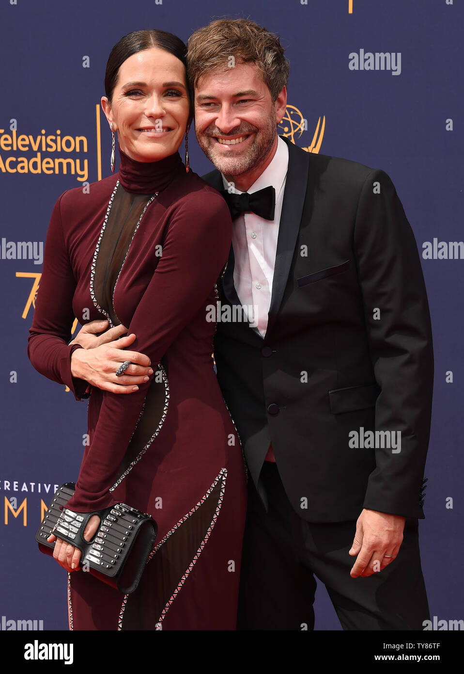 (L-R) Actress Katie Aselton and husband Mark Duplass attend the