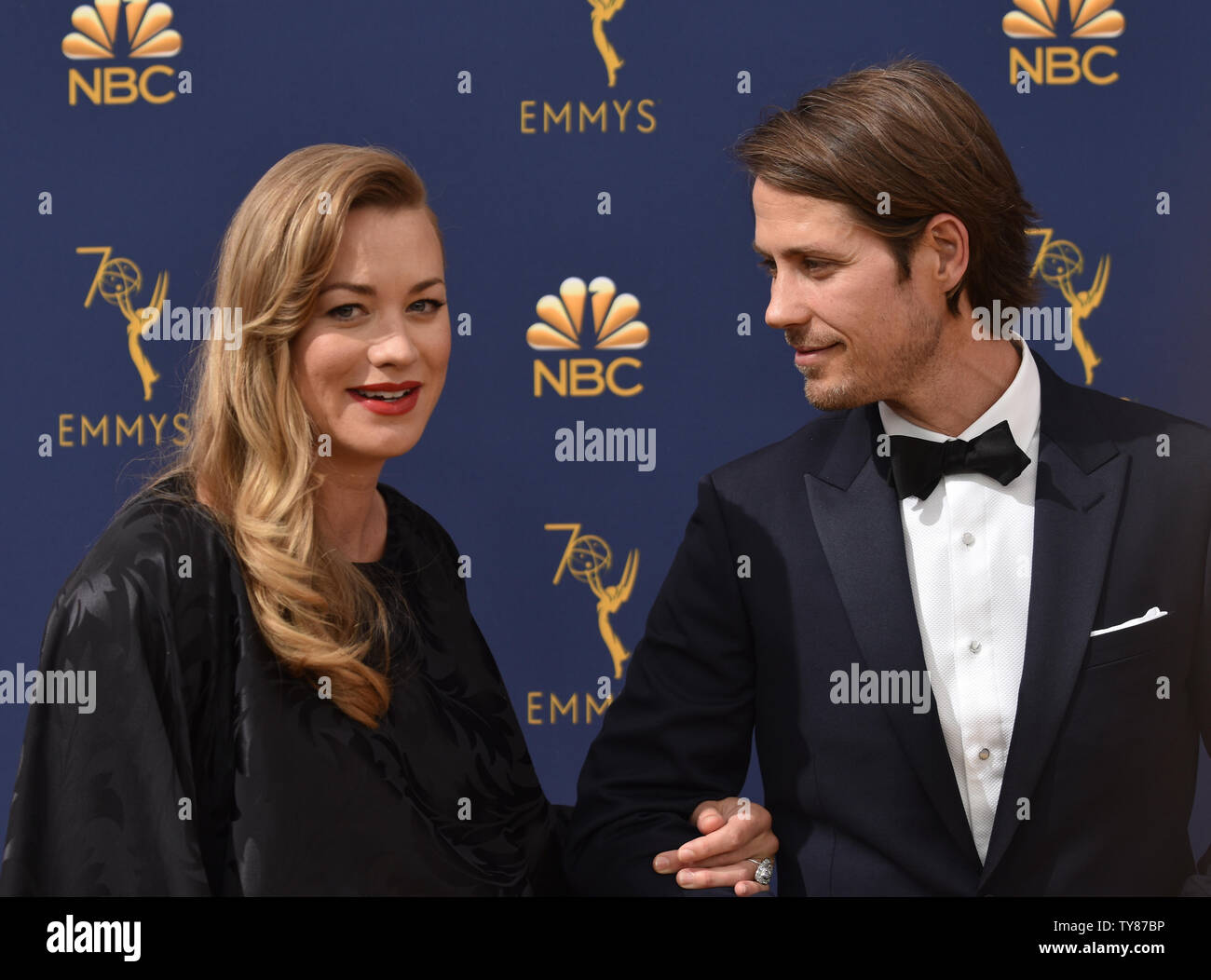 Actors Yvonne Strahovski and Tim Loden attend the 70th annual Primetime Emmy Award at the