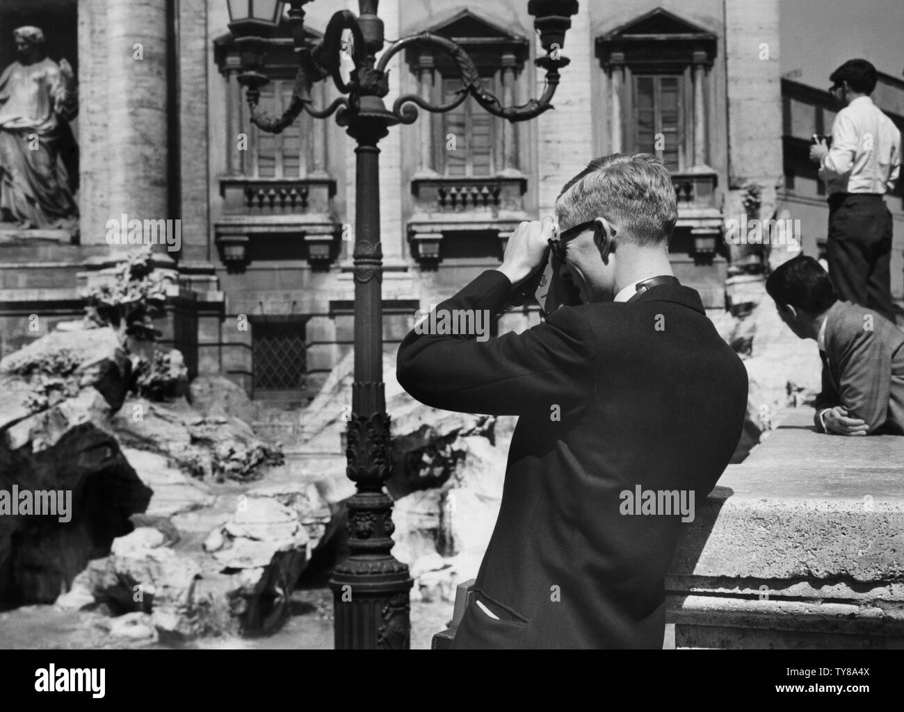 Photographing trevi fountain Black and White