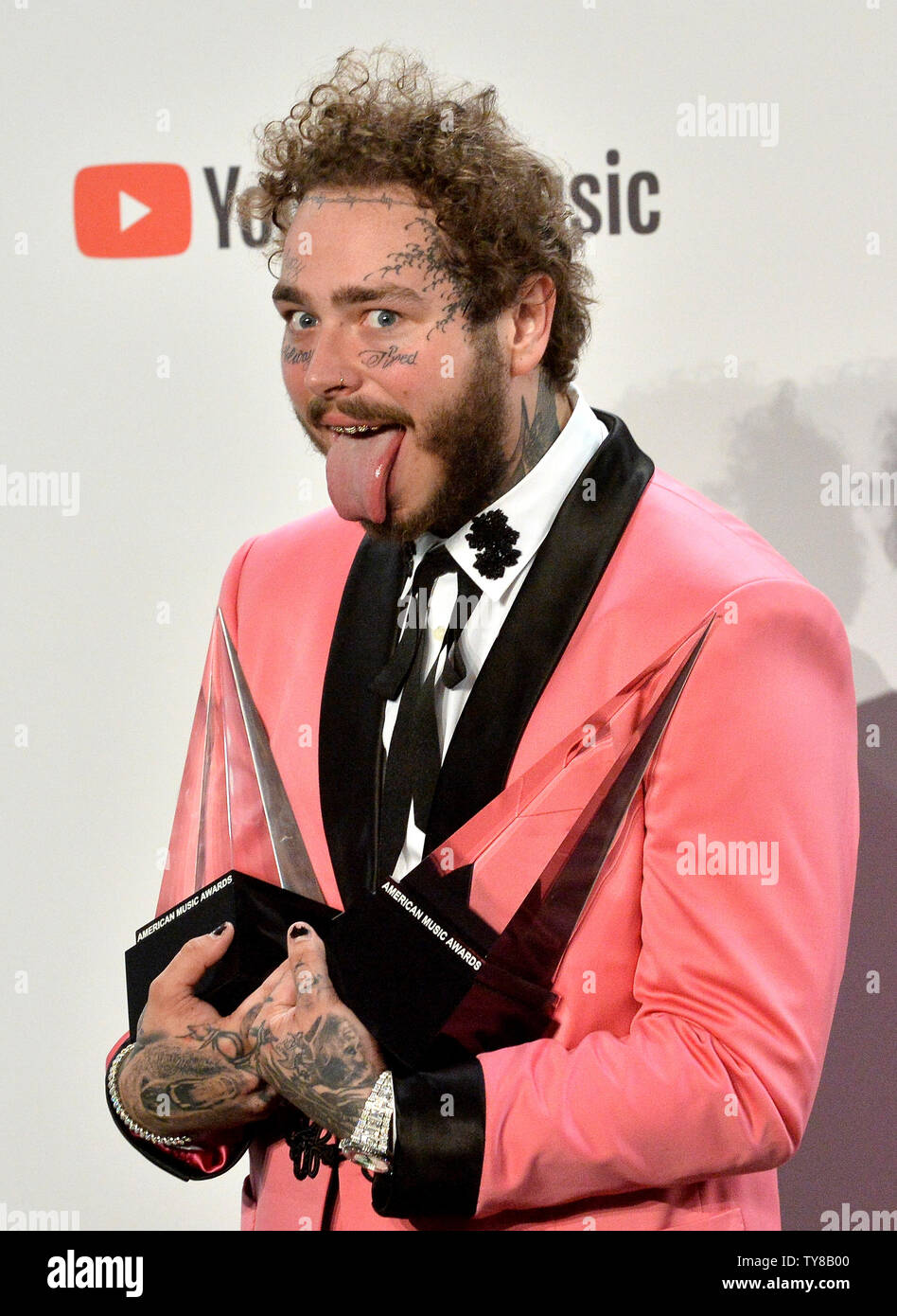 American Rapper Post Rapper Post Malone appears backstage with his award for Favorite Male ...