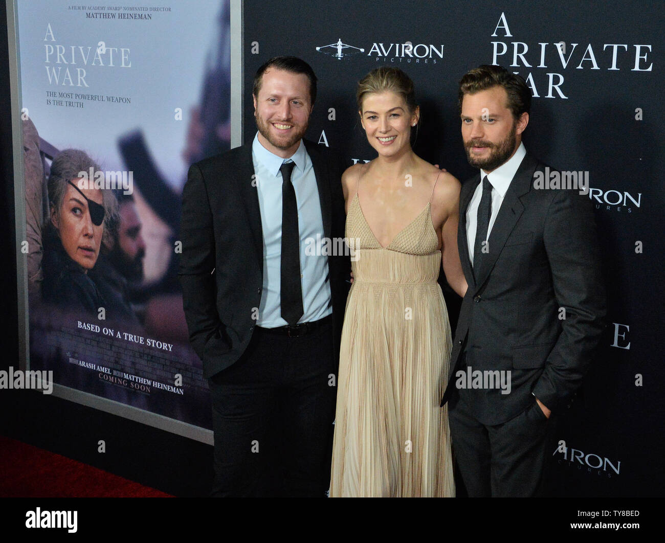 Director Matthew Heineman and cast members Rosamund Pike and Jamie Dornan (L-R) attend the premiere of the motion picture biographical war drama 'A Private War' at the Academy of Motion Picture Arts & Sciences in Beverly Hills, California on October 24, 2018.  The film tells the story of one of the most celebrated war correspondents of our time, Marie Colvin, who is an utterly fearless and rebellious spirit, driven to the frontline of conflicts across the globe to give voice to the voiceless. Photo by Jim Ruymen/UPI Stock Photo