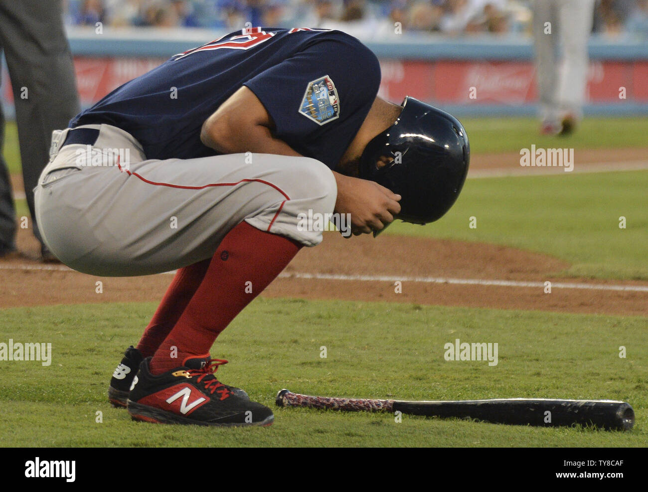 Boston Red Sox starting pitcher Eduardo Rodriguez reacts after being hit near the right elbow on a pitch from Los Angeles Dodger pitcher Rich Hill during the third inning in game four of the MLB 2018 World Series at Dodger Stadium in Los Angeles on October 27, 2018.  The Red Sox hold a 2-1 series lead over the Dodgers.  Photo by Jim Ruymen/UPI Stock Photo