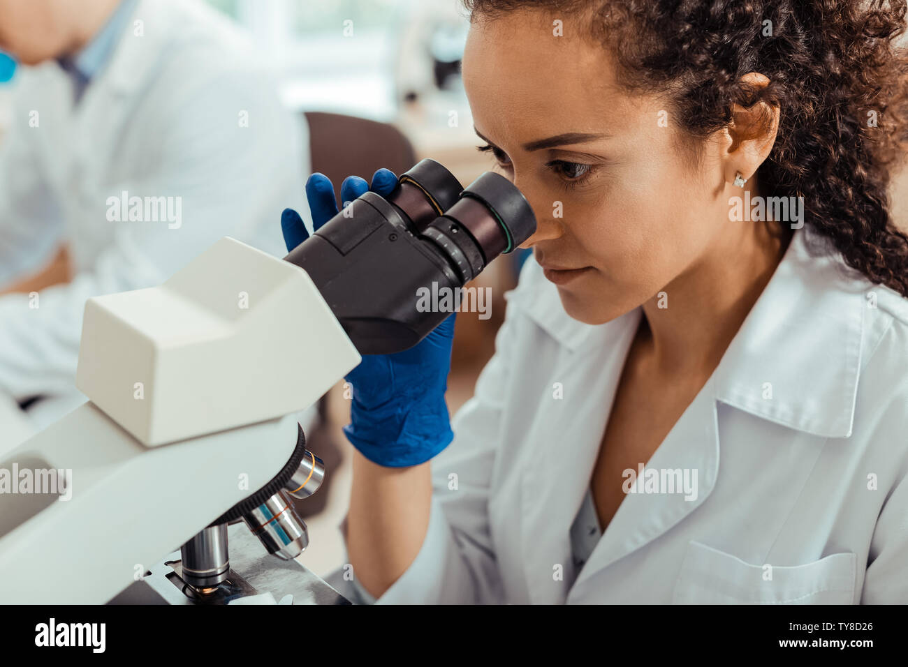 Face of a smart young female biologist Stock Photo