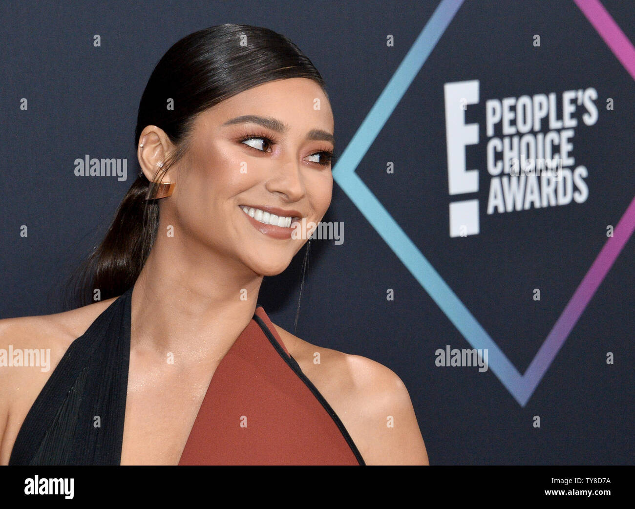 Actress Shay Mitchell arrives for the 44th annual E! People's Choice