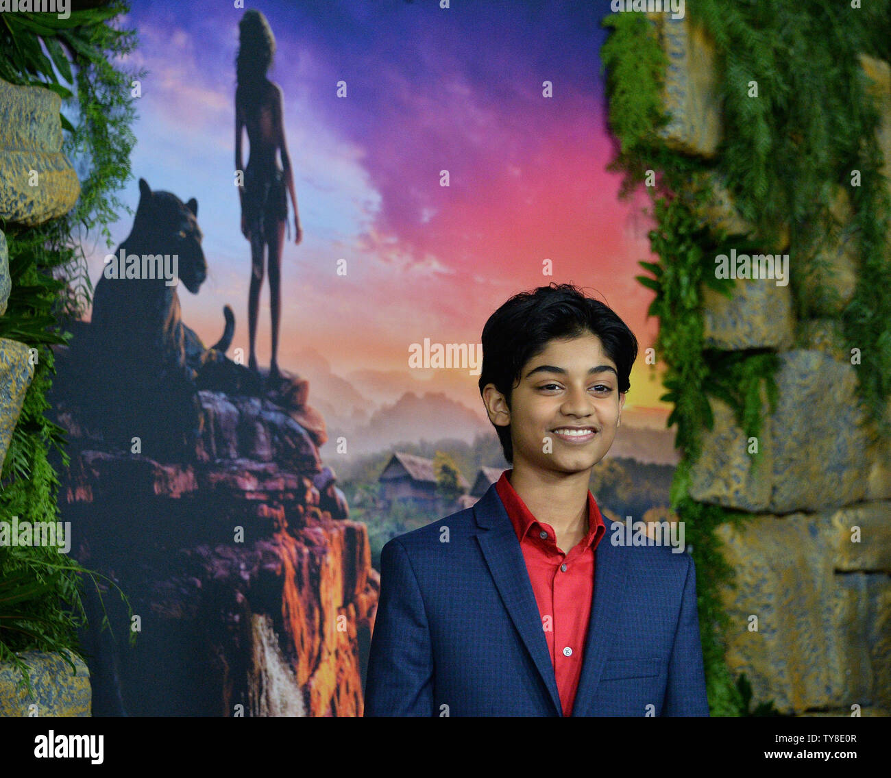 Cast member Rohan Chand attends the premiere of the motion picture drama 'Mowgli: Legend of the Jungle' at the ArcLight Cinema Dome in the Hollywood section of Los Angeles on November 28, 2018. Based on the novel by Rudyard Kipling The story follows the upbringing of the human child Mowgli raised by a pack of wolves in the jungles of India. As he learns the often harsh rules of the jungle, under the tutelage of a bear named Baloo and a black panther named Bagheera, Mowgli becomes accepted by the animals of the jungle as one of their own, except for one; the fearsome tiger Shere Khan. But there Stock Photo