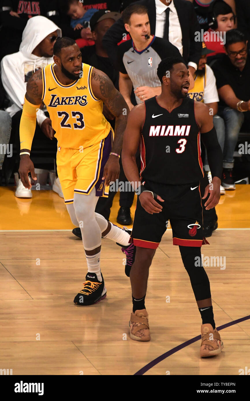 Former teammates LeBron James and DeWayne Wade (R) during game at Staples Center in Los Angeles, December 10, 2018.  Photo by Jon SooHoo/UPI Stock Photo