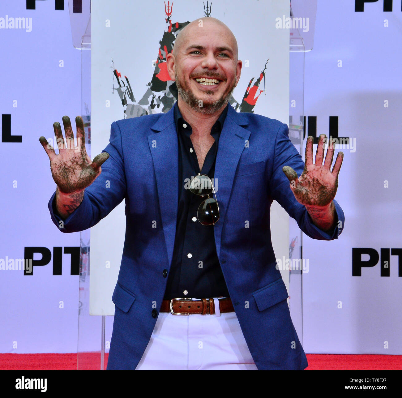 https www alamy com american rapper armando christian perez known by the stage name pitbull participates in a hand and footprint ceremony immortalizing him in the forecourt of the tcl chinese theatre formerly graumans in the hollywood section of los angeles on december 14 2018 photo by jim ruymenupi image257728247 html