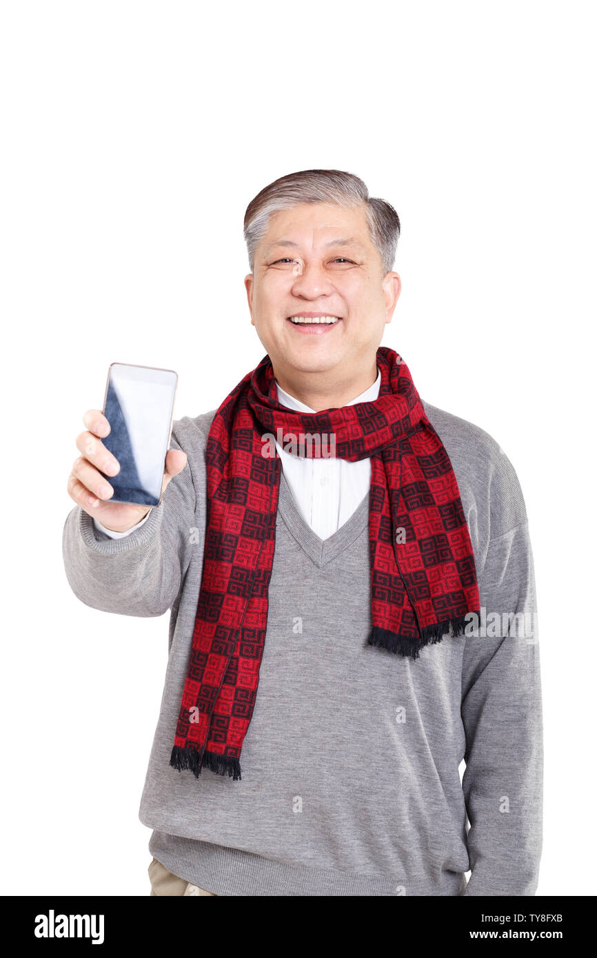 portrait old smiling Asian man standing confidently Stock Photo