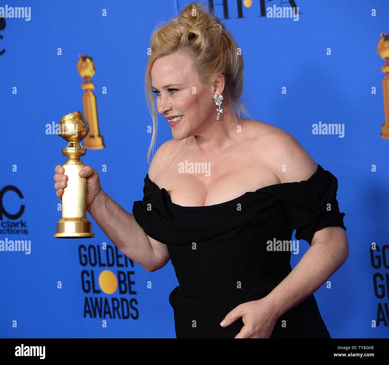 Actor Patricia Arquette appears backstage after winning the award for
