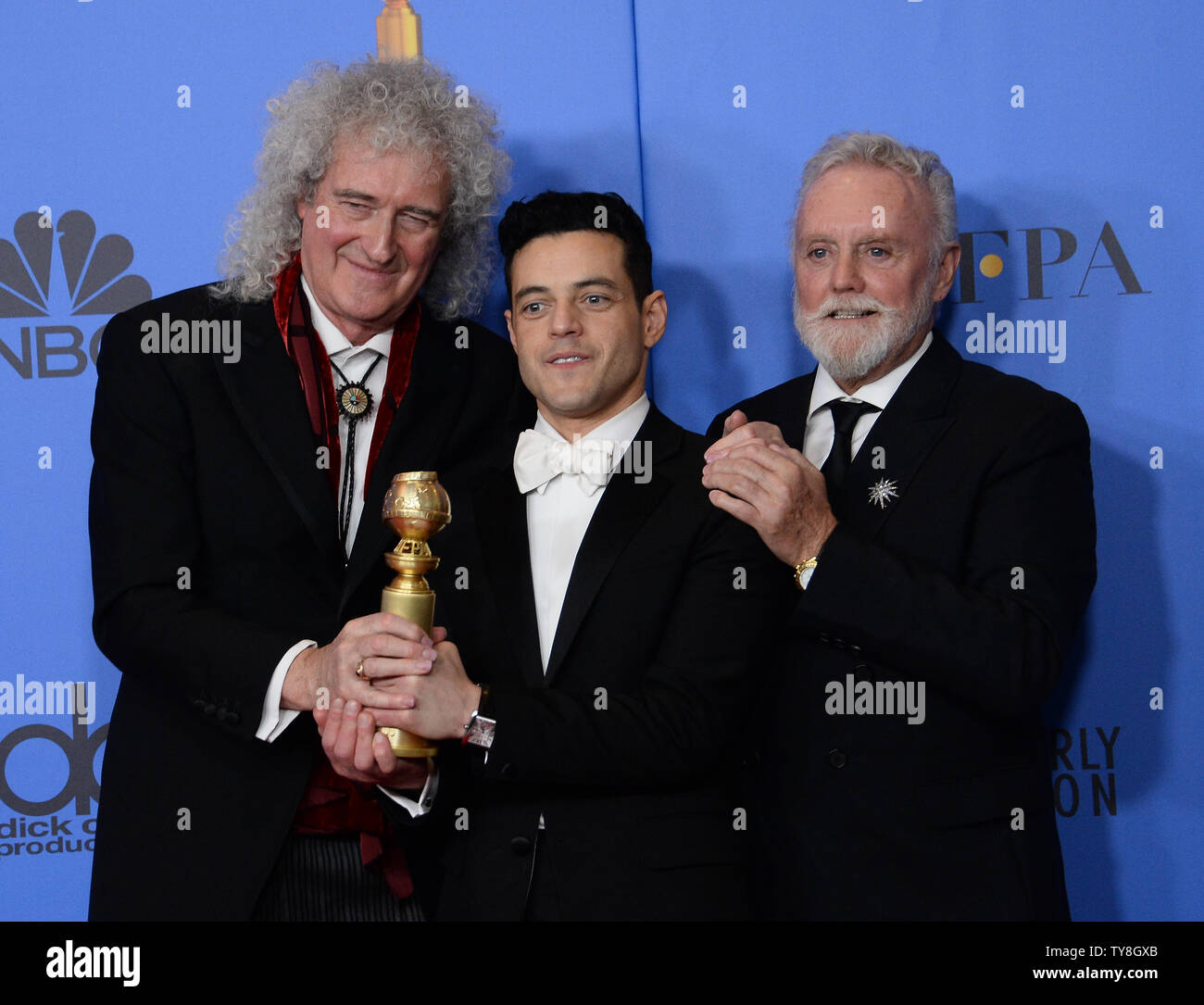 (l-r): Actors Brian May, Rami Malek and Roger Taylor of Queen appears ...