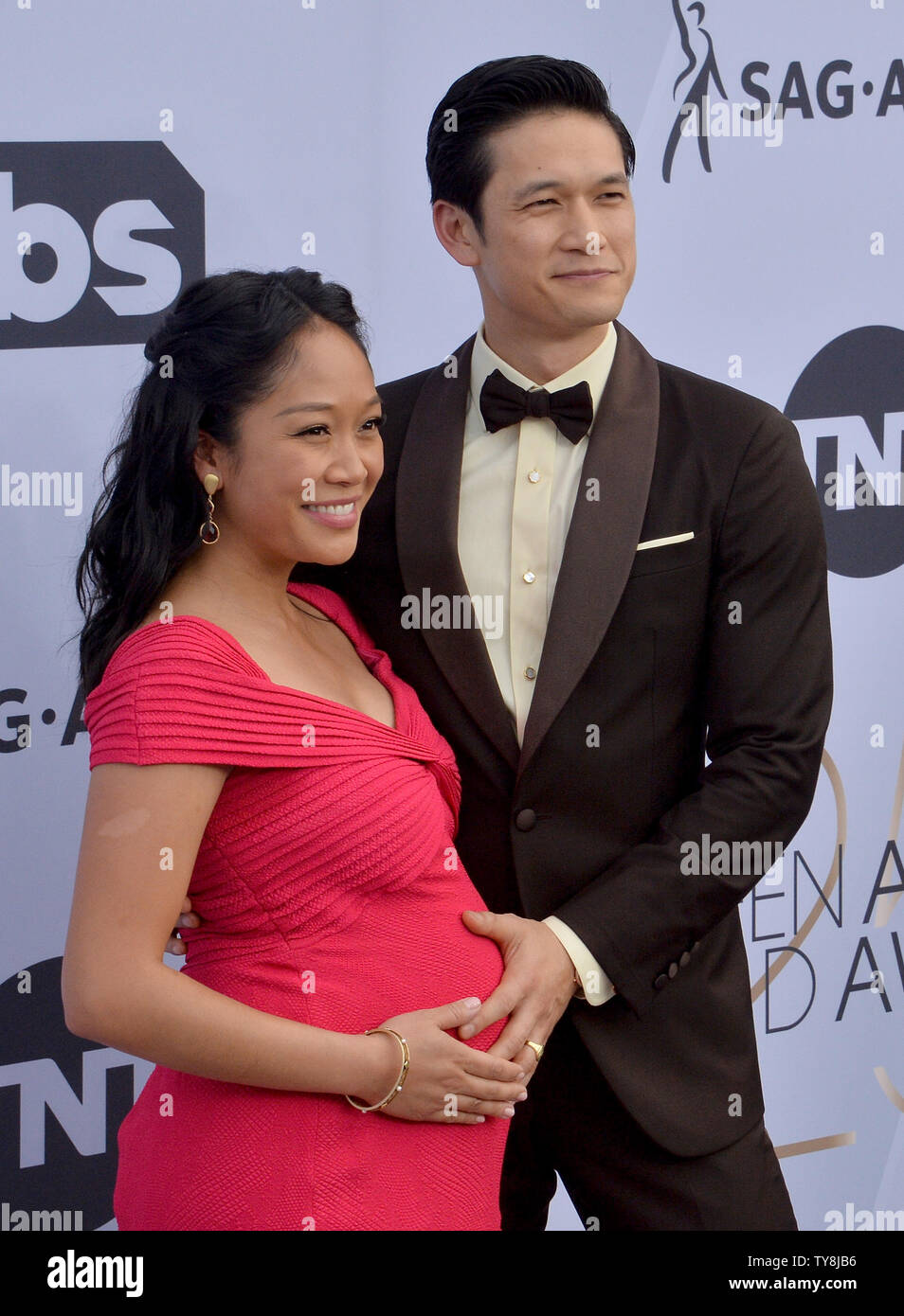 Shelby Rabara and Harry Shum Jr. arrive for the the 25th annual SAG