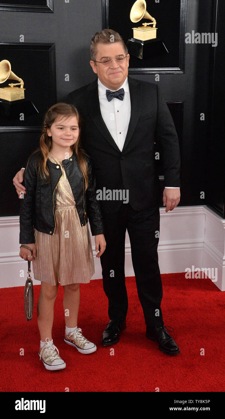 Patton Oswalt (R) and his daughter Alice arrive for the 61st annual