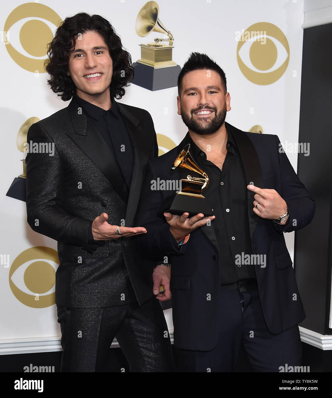 Dan + Shay appear backstage with their award for Best Country Duo/Group