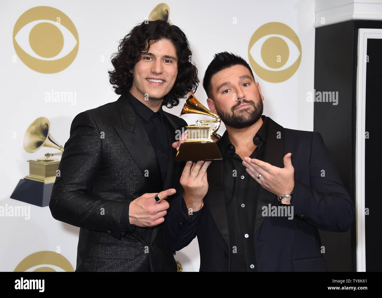 Dan + Shay appear backstage with their award for Best Country Duo/Group