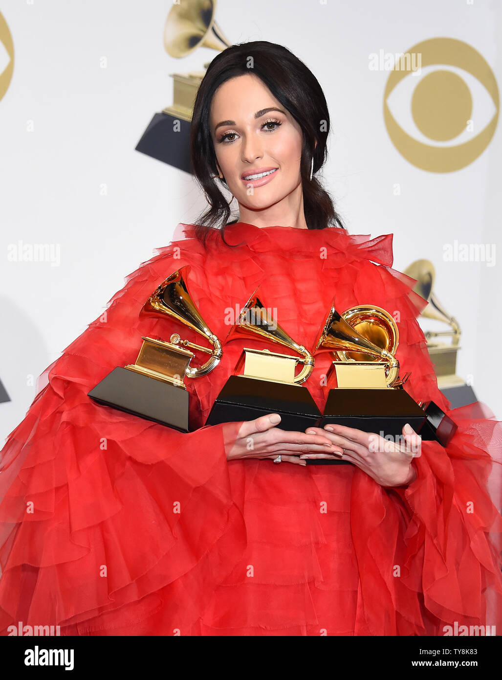 Kacey Musgraves Appears Backstage With Her Awards For Best Country