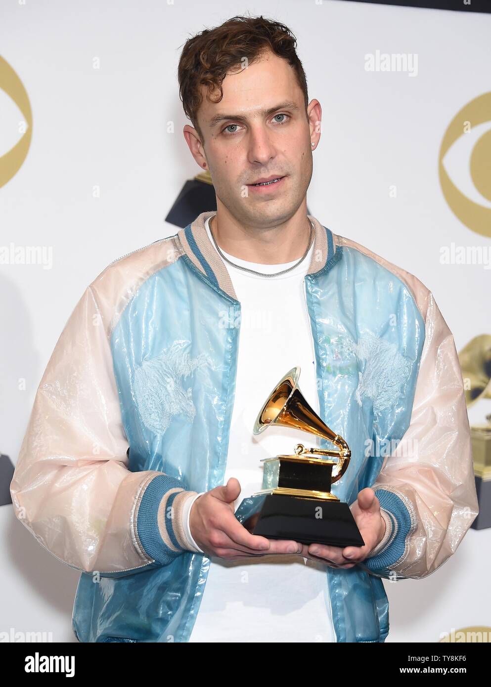 Cole M. GreifNeill appears backstage with his award for Best