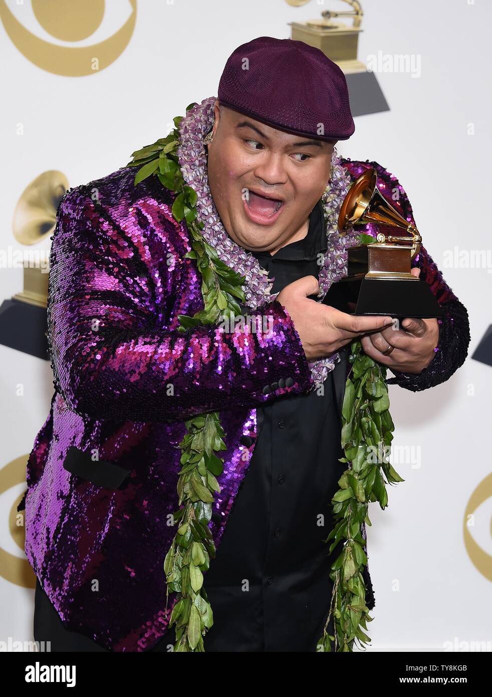 Kalani Pe'a appears backstage with his award for Best Regional Roots