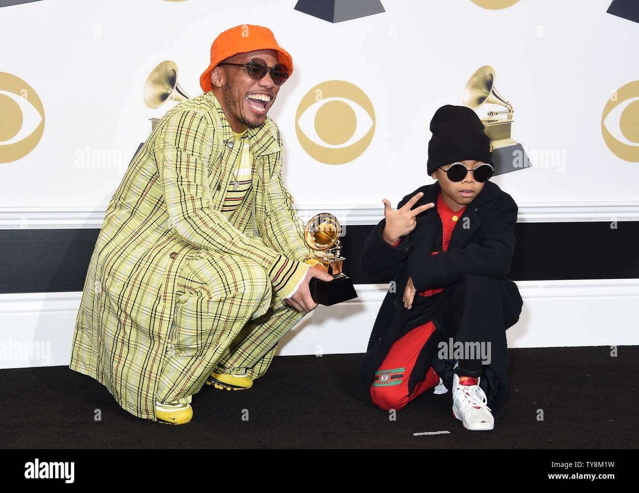 Anderson .Paak appears backstage with his award for Best Rap