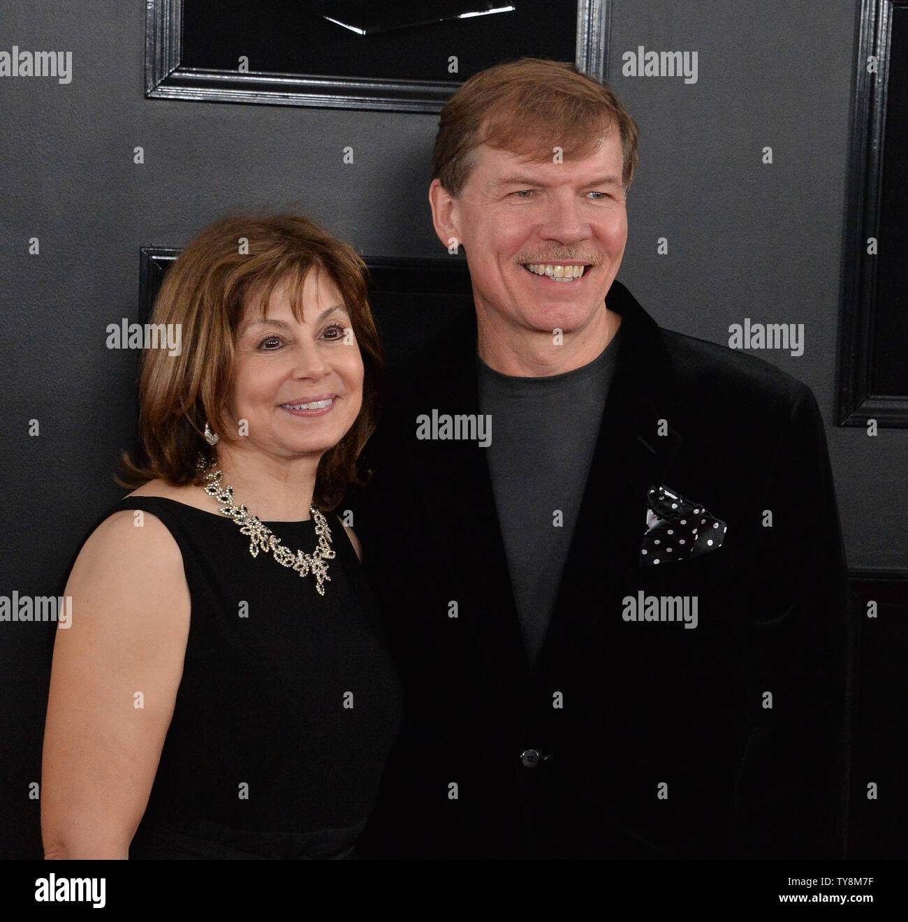 Kenneth Fuchs (R) and JoAnn Falletta arrive for the 61st annual Grammy ...
