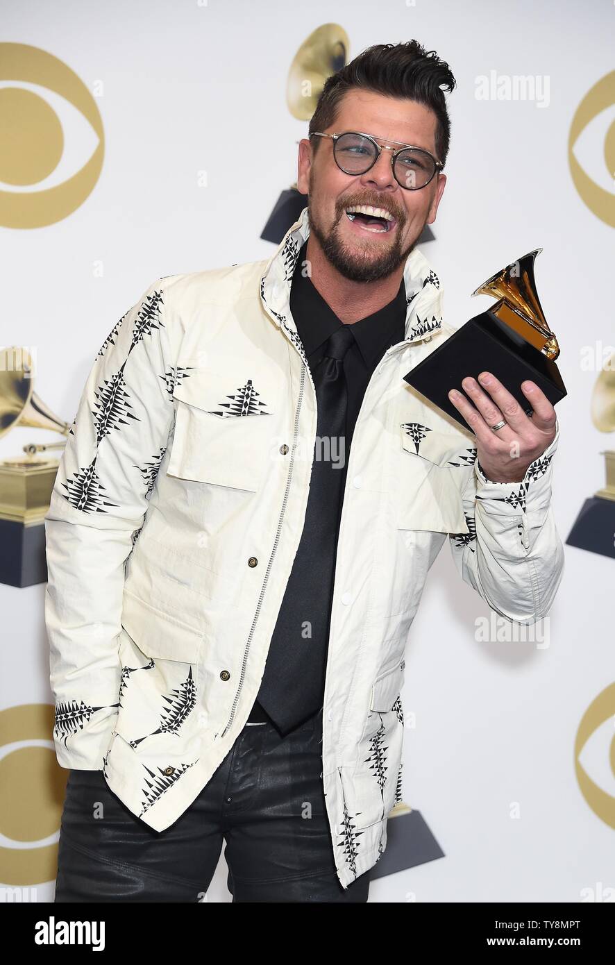 Jason Crabb appears backstage with his award for Best Roots Gospel