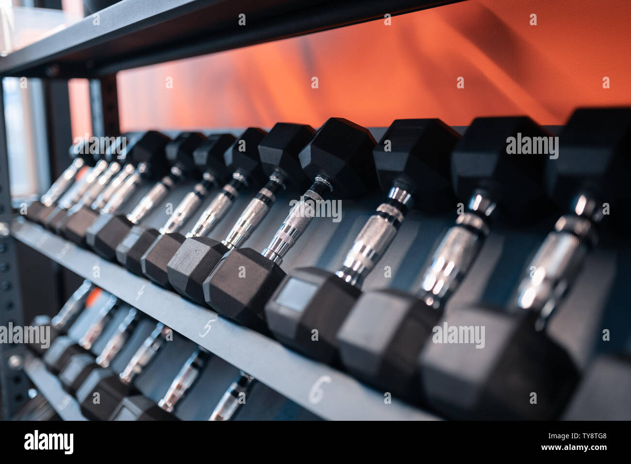 Close up of big amount of barbells lying in fitness gym Stock Photo