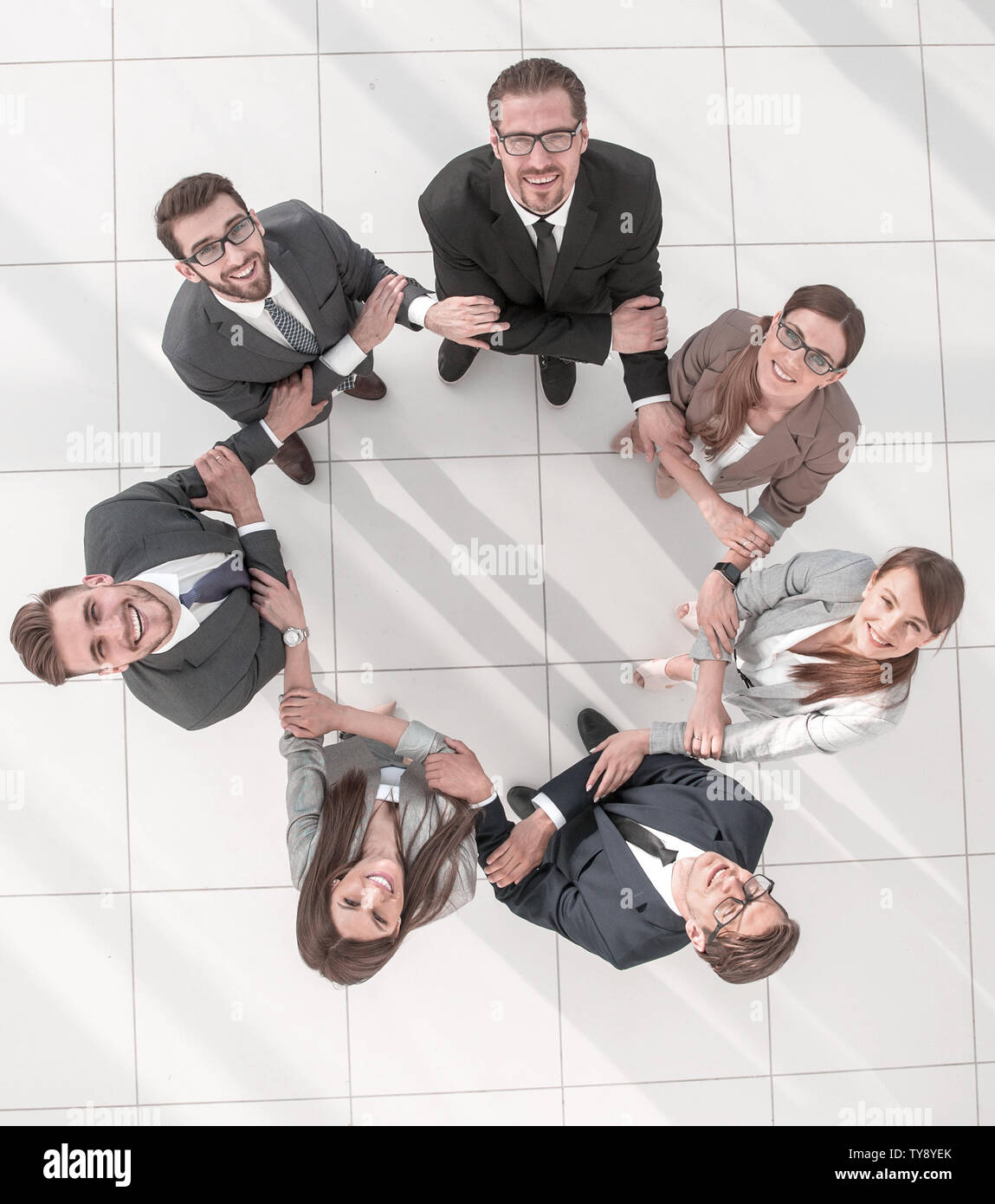 top view. business team standing in a circle Stock Photo - Alamy