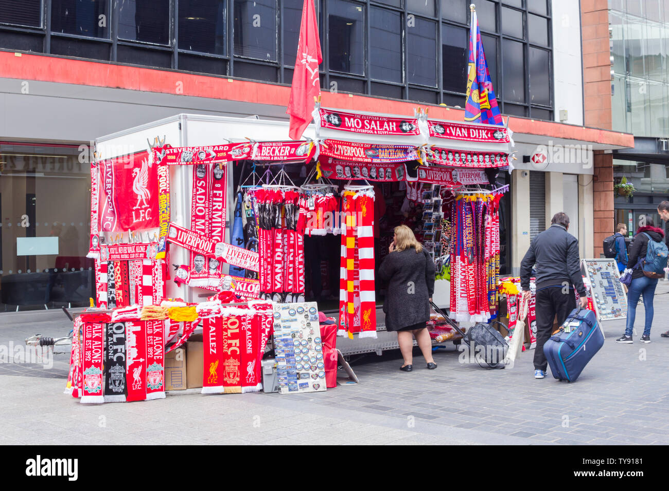 Liverpool Football Club supporter scarves  for sale on a mobile market stall on Whitechapel near its junction with Church Street. Stock Photo