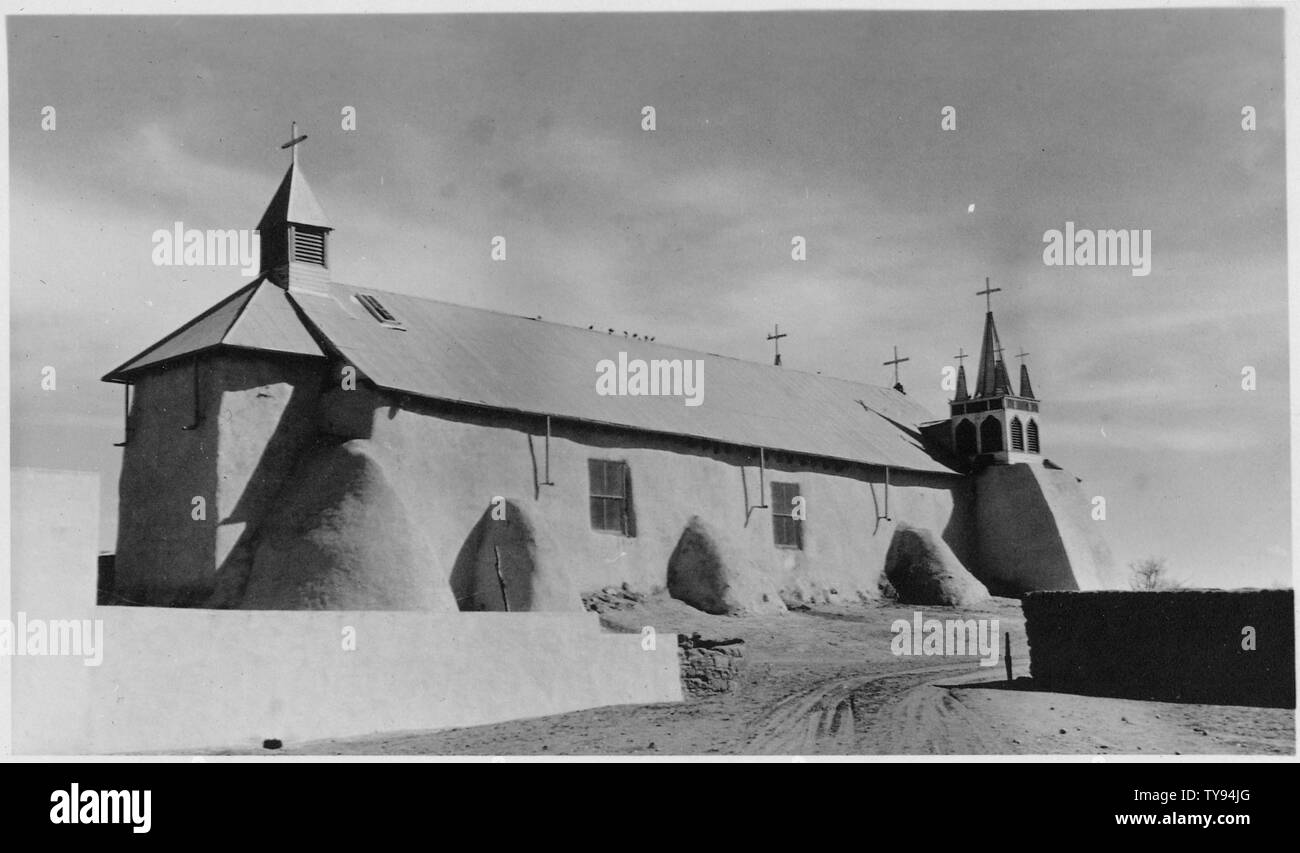 Mission building at United Pueblos Agency.; Scope and content:  This is a photograph of the McCarty's, Acomita, or Santo Domingo day schools, administered by the United Pueblos Agency in New Mexico. The Agency was formed in 1935 at Albuquerque, by consolidating the Santa Fe and Albuquerque Indian Schools, the Zuni Indian Agency, the Albuquerque Sanatorium, the Northern and Southern Pueblos Agencies, and the Navajo communities at Canoncito and Alamo. The day schools at which this photograph was taken was formerly under the jurisdiction of the Southern Pueblos Agency. Stock Photo