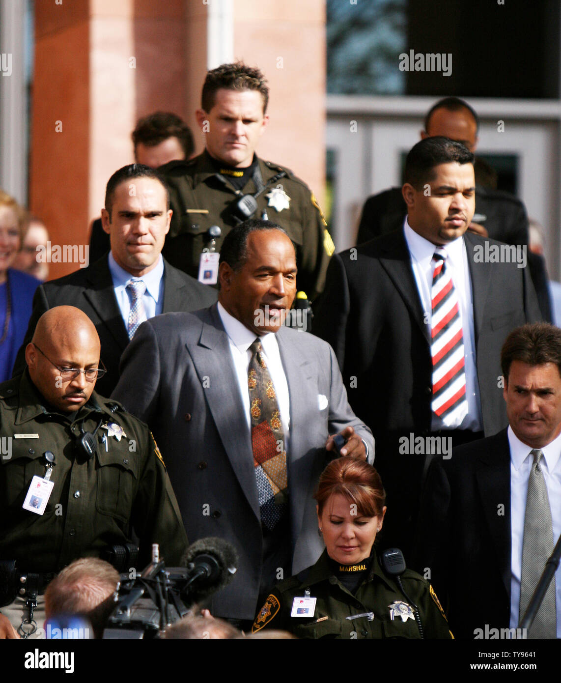 O.J. Simpson leaves court following his arraignment hearing in Las