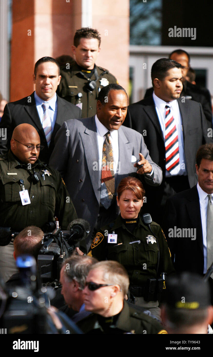 O.J. Simpson leaves court following his arraignment hearing in Las