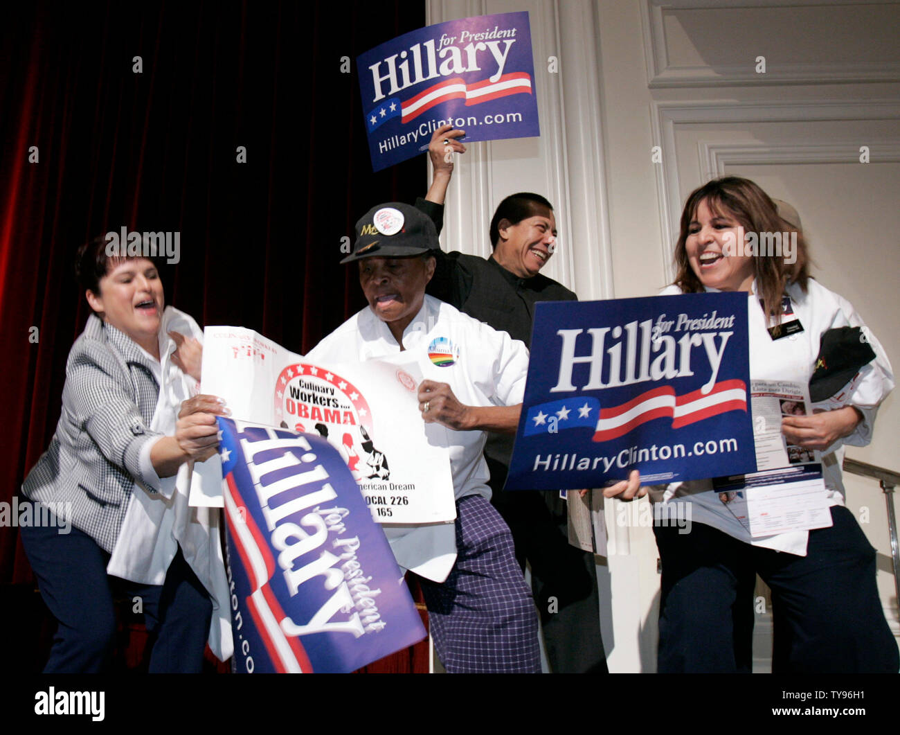 Attendees jockey for position with their signs showing their support for candidates Sen. Hillary Clinton (D-N.Y.) and Sen. Barack Obama (D-IL) before the start of the Democratic caucus in the Bellagio Hotel in Las Vegas on January 19, 2008. (UPI Photo/Mark Cowan) Stock Photo