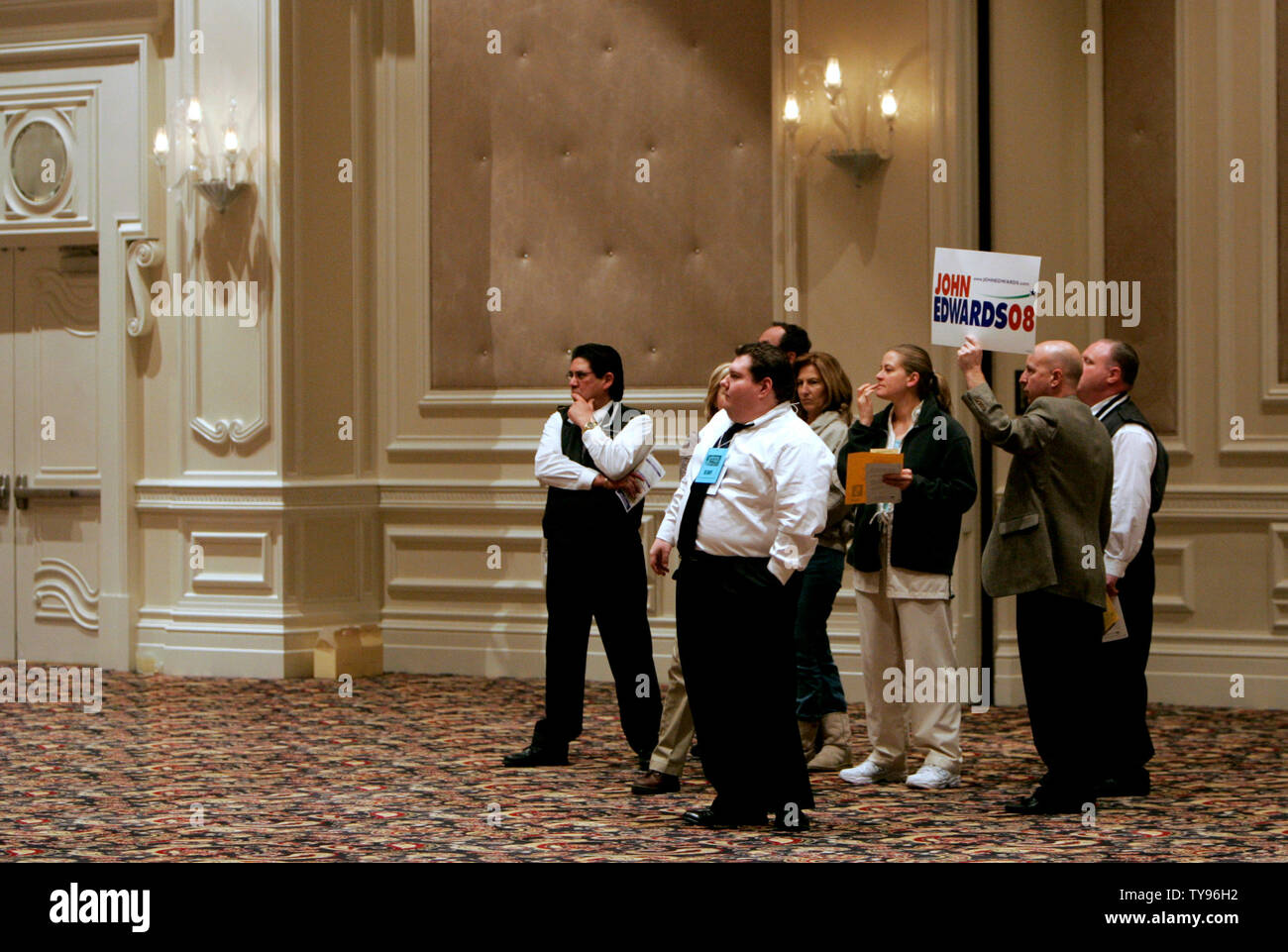 Supporters of Democratic presidential candidate John Edwards gather during the Democratic caucus being held in the Bellagio Hotel on January 19, 2008., in Las Vegas. Edwards finished a distant third behind candidates Barack Obama (D-IL) and Hillary Clinton (D-N.Y.). (UPI Photo/Mark Cowan) Stock Photo