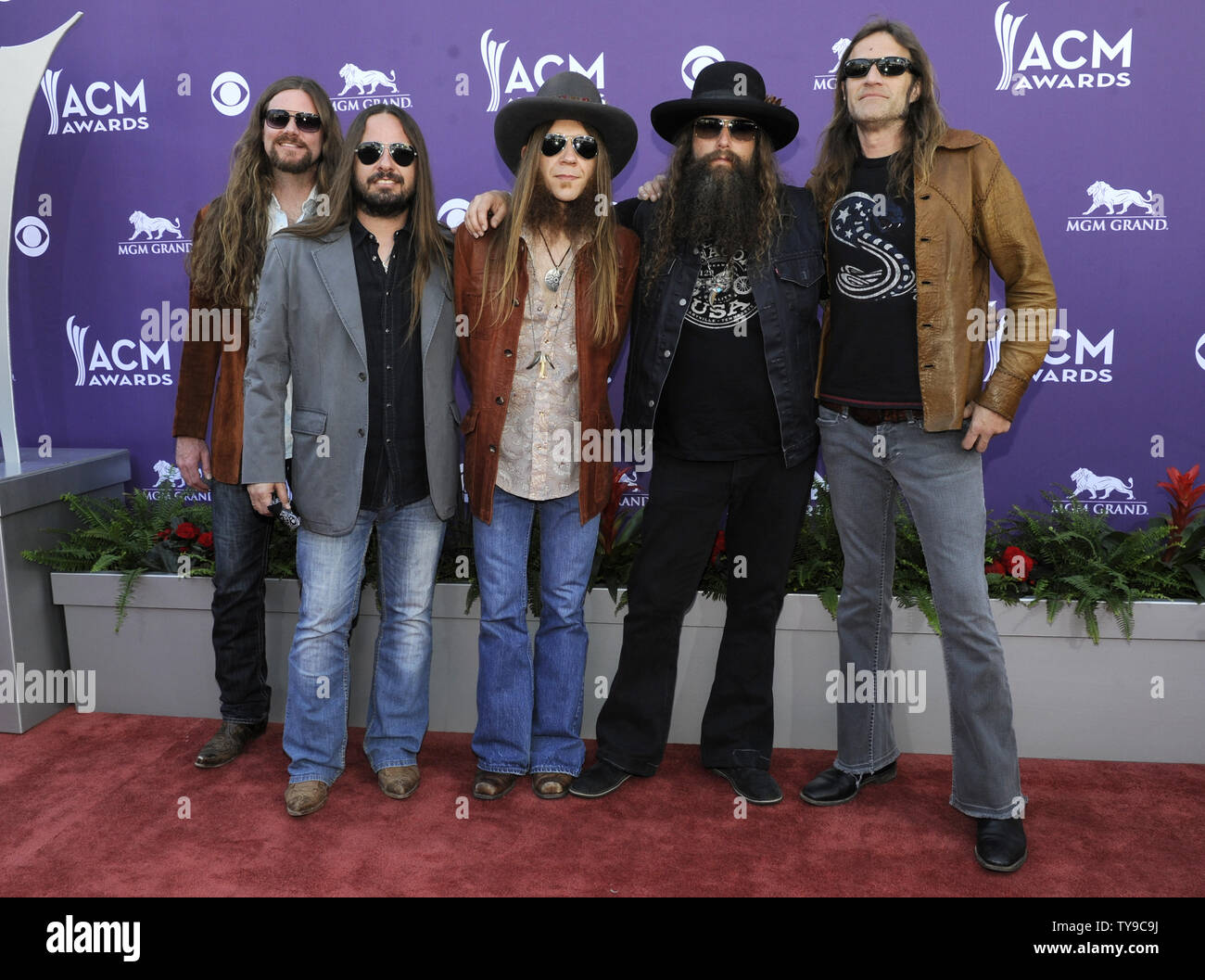 (L-R) Brandon Still, Paul Jackson, Charlie Starr, Brit Turner, and Richard Turner of music group Blackberry Smoke arrive at the 48th annual Academy of Country Music Awards at the MGM Hotel in Las Vegas, Nevada on April 7, 2013. UPI/David Becker Stock Photo