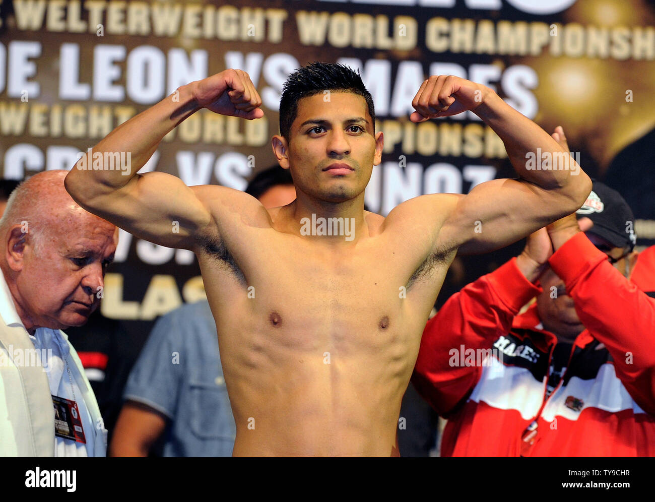 Boxer Abner Mares weighs in before his WBC Featherweight title fight